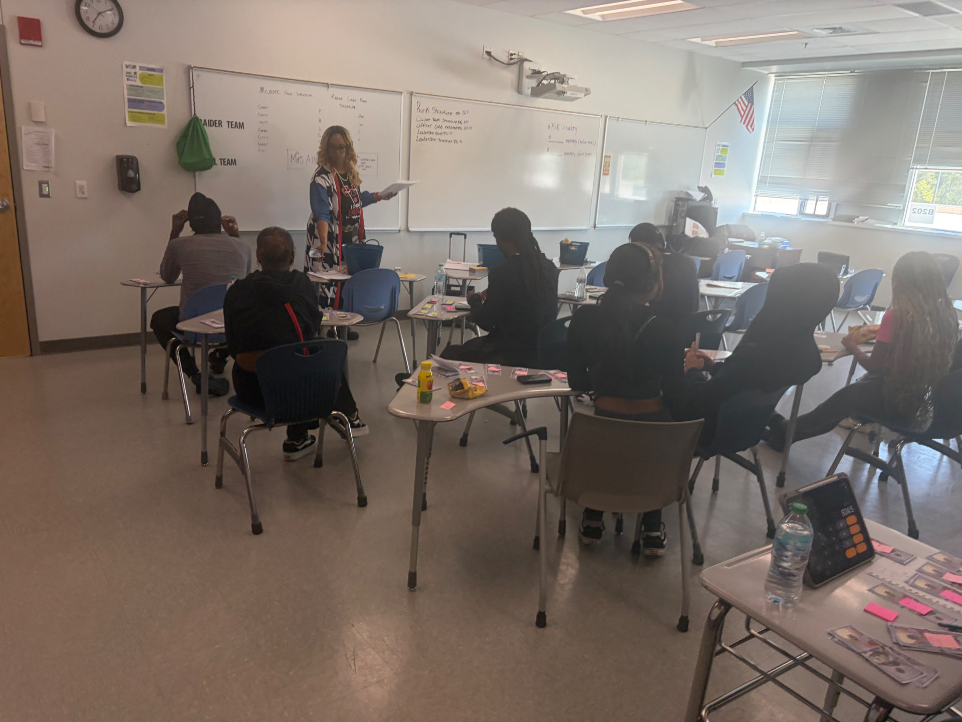 Jus One Academy participants in a financial empowerment and entrepreneurship session